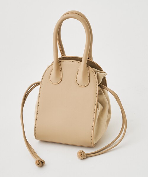 Chico(チコ)の「ラウンドコンビ巾着ショルダーバッグ(トートバッグ・レディース・アイボリー/ベージュ/ブラック・F)」の2枚目の写真