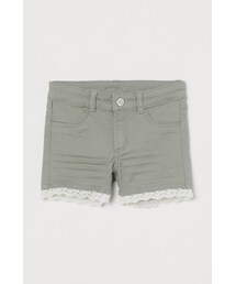 H&M（エイチ・アンド・エム）の「H&M - レーストリム ツイルショートパンツ - グリーン（その他パンツ・キッズ）」