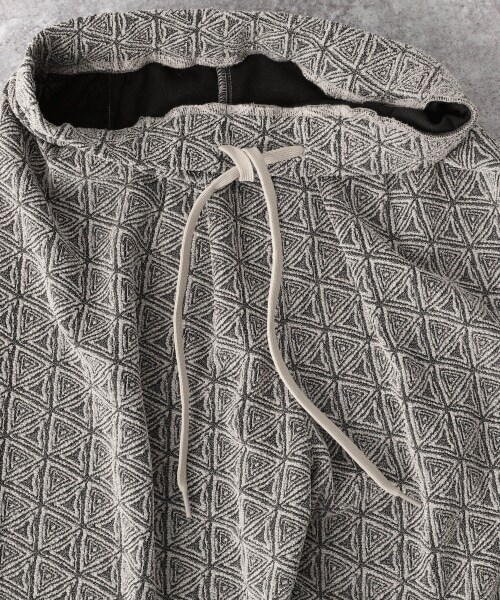 JEANASIS（ジーナシス）の「ニュアンスキカラメジャガードパンツ（パンツ・アイボリー()/ブラック()/ライトグリーン()/ライトパープル()）」の18枚目の写真