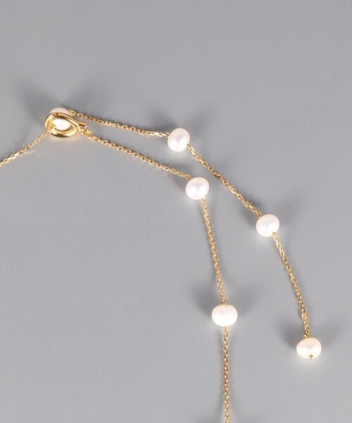 PAS TIERRA(パティエラ)の「ステーションロングネックレス(アクセサリー・ゴールド)」の4枚目の写真