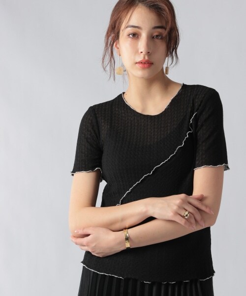 Ezick（エジック）の「メロー透かし編みプルオーバー（トップス・ホワイト/ブラック）」の2枚目の写真