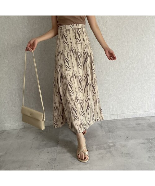 copine(コピン)の「ゼブラ柄マーメイドスカート (2color)(スカート・レディース・アイボリー/モカ・ワンサイズ)」の1枚目の写真