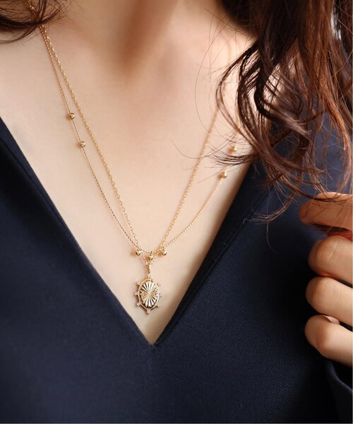 Lilas(リラ)の「オーバルモチーフ*8ピースダイヤチャーム K10(腕時計・ゴールド/(090)/フリー/残り1点)」の1枚目の写真