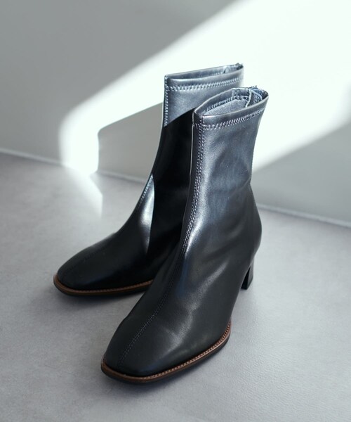 DISCOAT(ディスコート)の「スタックヒールストレッチブーツ(ブーティ・レディース・ブラック/アイボリー・M/L)」の2枚目の写真