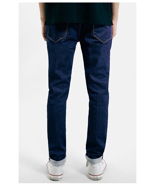 TOPMAN（トップマン）の「Topman Coated Skinny Fit Raw Denim Jeans (Mid Blue)（デニムパンツ・メンズ・Mid Blue・Regular 34R/Regular 30R/Regular 32R/Regular 36L/Regular 32L/Regular 34L/Regular 30S/Regular 32S）」の2枚目の写真