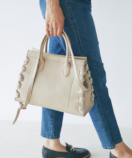 un dix cors(アンディコール)の「《予約》【cache cache(カシュカシュ)】リボンかがり2WAYバッグ(ショルダーバッグ・レディース・アイボリー/イエロー/モカ・F)」の2枚目の写真