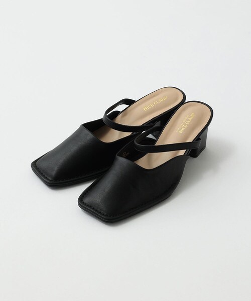 one after another NICE CLAUP（ワンアフターアナザーナイスクラップ）の「ストラップ付ミュール（その他シューズ・レディース・アイボリー/ブラック・1/2/3）」の2枚目の写真