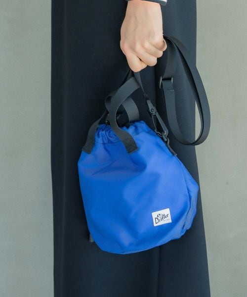 LEPSIM（レプシィム）の「キンチャクバッグ（バッグ・レディース・ダルメシアン10/カウ柄50/ブルー85・ONE SIZE）」の3枚目の写真