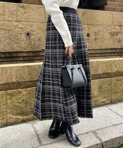 Chez toi（シェトワ）の「裾フリンジチェックニットスカート（スカート