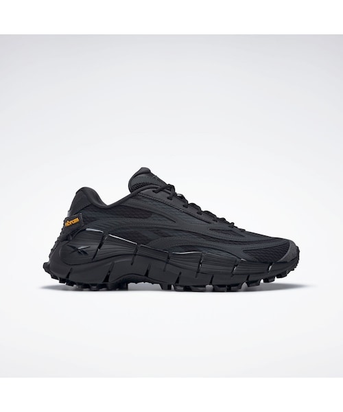 Reebok(リーボック)の「ジグ キネティカ 2.5 / Zig Kinetica 2.5X (ブラック)(シューズ・ブラック・225 (22.5cm)/230 (23.0cm)/235 (23.5cm)/240 (24.0cm)/245 (24.5cm)/250 (25.0cm)/255 (25.5cm)/260 (26.0cm)/265 (26.5cm)/270 (27.0cm)/275 (27.5cm)/280 (28.0cm)/285 (28.5cm)/290 (29.0cm)/295 (29.5cm)/300 (30.0cm)/310 (31.0cm))」の1枚目の写真