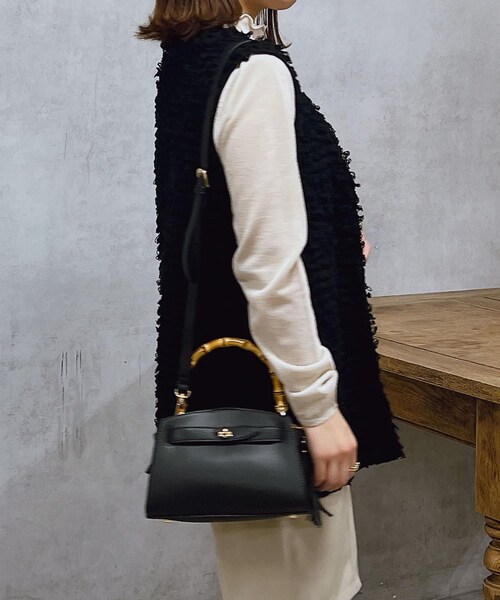 un dix cors（アンディコール）の「《予約》【cachecache（カシュカシュ）】バンブーひねりミニバッグ（ショルダーバッグ・レディース・アイボリー/オレンジ/ブラック・F）」の2枚目の写真