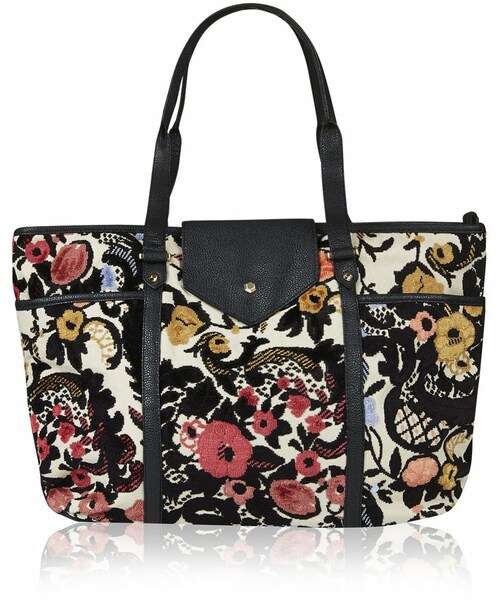 tote bag in a floral tapestry fabric. with
