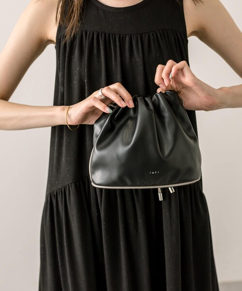 mystic（ミスティック）の「loti パイピング巾着ショルダー（バッグ・レディース・アイボリー/ブラック・ONE）」の2枚目の写真