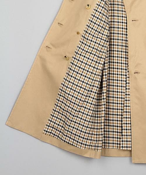 ベージュ コート チェック裏地 MJUKA.（ミューカ）の「トレンチコート（裏地ボーダー/裏地チェック