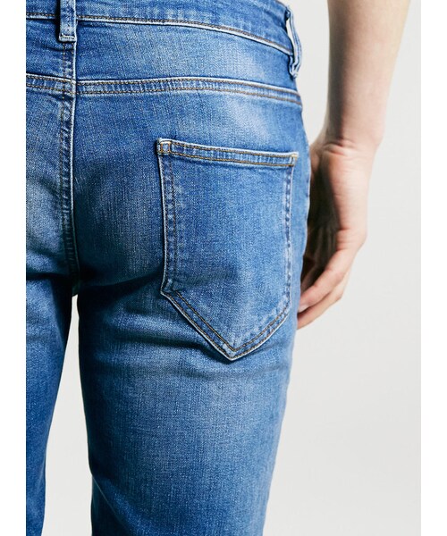 TOPMAN(トップマン)の「Mid Wash Blue Stretch Skinny Jeans(デニムパンツ・メンズ・Blue・36L/28S/30S/32S/34L/32L/30L/34S/36R/34R/32R/28R/30R)」の5枚目の写真