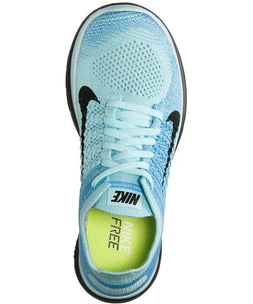 NIKE(ナイキ)の「Nike Women's Free Flyknit 4.0 Running Sneakers from Finish Line(スニーカー・レディース・GLACIER ICE/BLACK/BLUE・6.5/5/7.5/9.5/7/8/11/6/9/8.5/5.5)」の4枚目の写真