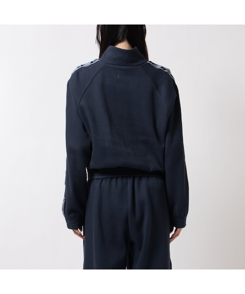 Reebok（リーボック）の「ジムワッグ ハーフジップ ニット