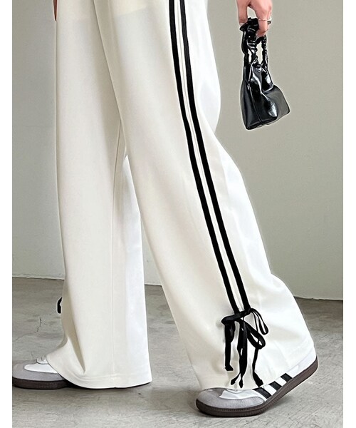 Re:EDIT（リエディ）の「ストレッチポンチサイドラインリボンジャージ