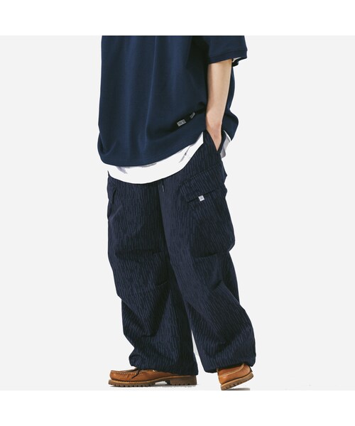ANGLAN(アングラン)の「CAMO OBLIQUE CARGO PANTS - NAVY - the great divide(その他・メンズ・other・M/L/XL)」の4枚目の写真