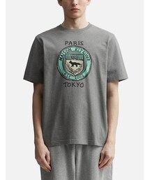 【MAISON KITSUNE】メンズ シティコインズT カーキ Maison Kitsune（メゾンキツネ）の「City Coins Comfort T-shirt