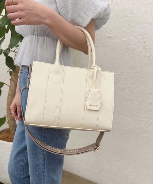 one after another NICE CLAUP(ワンアフターアナザーナイスクラップ)の「ミニロゴ入りトートバッグ(ショルダーバッグ・レディース・アイボリー/サックスブルー/ブラック・FREE)」の1枚目の写真
