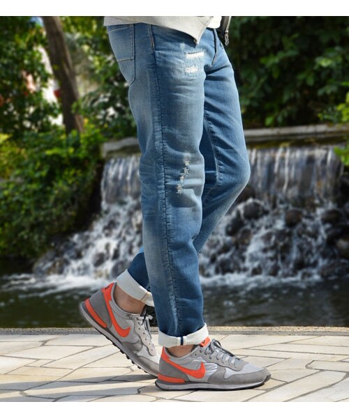 KATHARINE HAMNETT LONDON (キャサリンハムネットロンドン)の「REPAIR JOG DENIM(パンツ・メンズ・ネイビー・S/M/L/XL)」の2枚目の写真