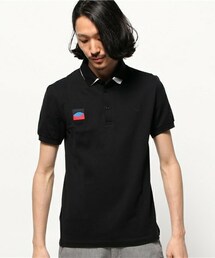 ABCDいいえ藤井様　フレッドペリー ラフシモンズ ポロシャツ【38】 Raf Simons X Fred Perry ロゴ ポロシャツ | ブラック | FARFETCH JP