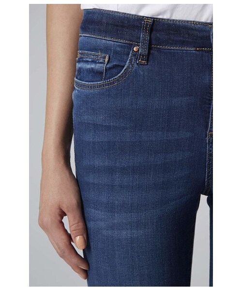 TOPSHOP（トップショップ）の「Topshop Moto 'Leigh' Ripped Skinny Jeans (Mid Denim)（デニムパンツ・レディース・Blue・25 (24 US)/26 (25-26 US)/28 (27 US)/30 (28-29 US)/32 (30-31 US)/34 (31-32 US)）」の3枚目の写真