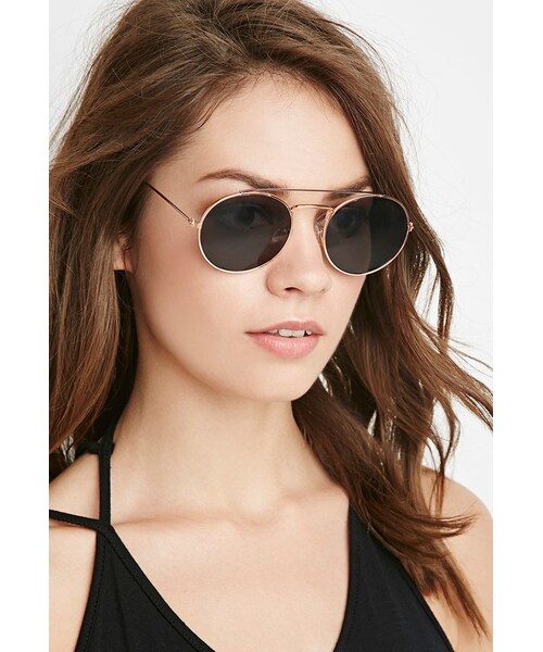 FOREVER 21(フォーエバー トゥエンティーワン)の「FOREVER 21 Round Aviator Sunglasses(サングラス・レディース・Gold・One size)」の1枚目の写真