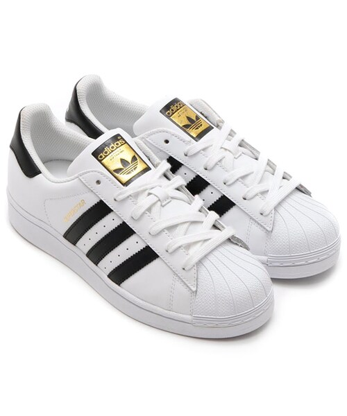 adidas(アディダス)の「adidas SUPERSTAR W (WHITE) ランニングホワイト/コアブラック/ランニングホワイト(シューズ・メンズ・ホワイト・22.5cm/23.0cm/23.5cm/24.0cm/24.5cm/25.0cm/25.5cm/26.0cm/26.5cm/27.0cm/27.5cm/28.0cm/28.5cm/29.0cm)」の1枚目の写真
